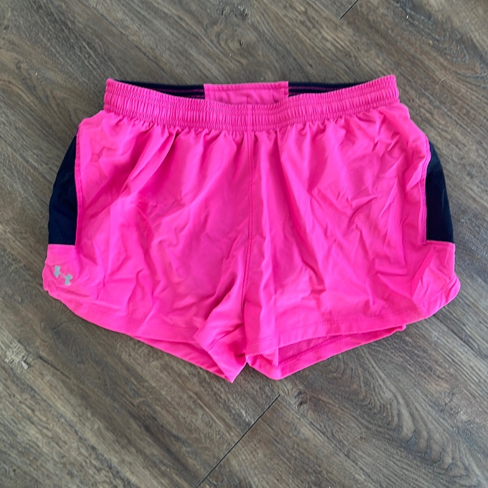 Under Armour pink athletic shorts. Size small.